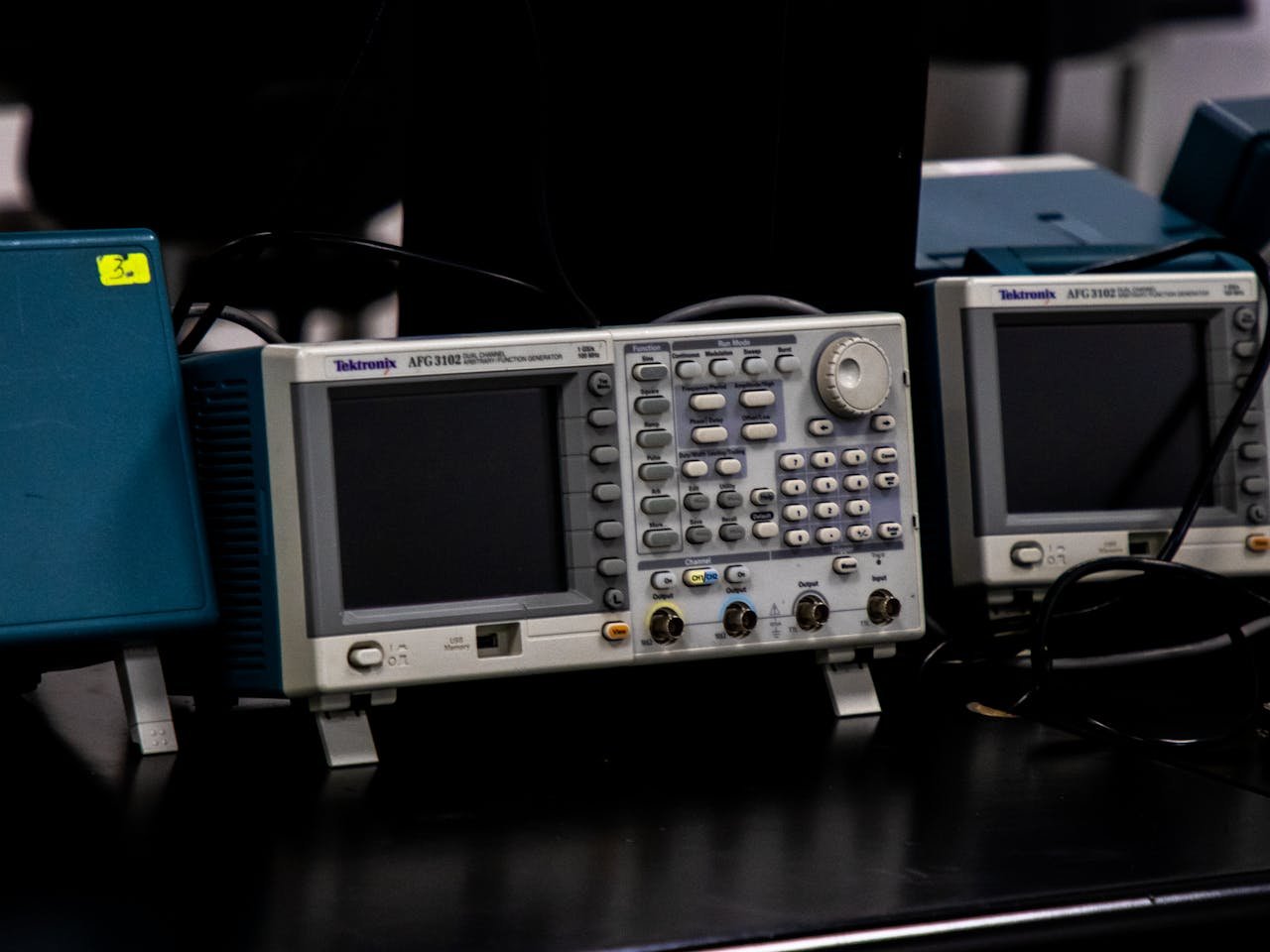 category-04 Close-up of electronic measuring equipment in a lab setting, showcasing precision technology.